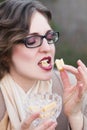 Woman eating sweet candy, toffee caramel Royalty Free Stock Photo