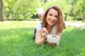 Woman eating tasty oatmeal outdoors