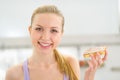 Woman eating toast with chocolate cream Royalty Free Stock Photo