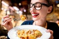 Woman eating tortellini pasta Royalty Free Stock Photo