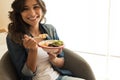 Woman eating a vegan bowl Royalty Free Stock Photo