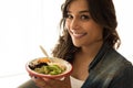 Woman eating a vegan bowl Royalty Free Stock Photo