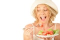 Woman eating vegetable salad