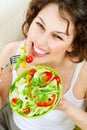 Woman Eating Vegetable Salad