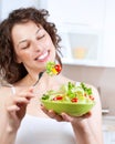 Woman Eating Vegetable Salad