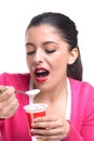 Woman eating yoghurt Royalty Free Stock Photo