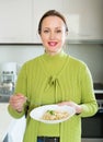 Woman eats rice Royalty Free Stock Photo