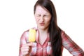 Woman eats a sour popsicle Royalty Free Stock Photo