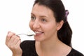 Woman eats yoghurt Royalty Free Stock Photo