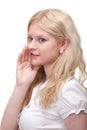 Woman eavesdropping with hand behind her ear