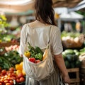Woman with eco bag shops at local farmers market