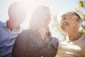 Woman, elderly parents and garden for sunshine lens flare, bonding or relax together in summer. Happy family, mother and Royalty Free Stock Photo