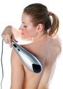 Woman with electric massager Royalty Free Stock Photo