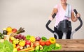 Woman with elliptical trainer