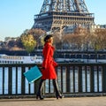 Woman on embankment near Eiffel tower in Paris, France walking Royalty Free Stock Photo