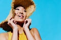 Woman emotion hat trendy summer yellow beauty smile swimsuit face fashion portrait style
