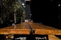 Woman at the end of the table outside of a bar