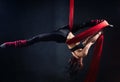 The woman is engaged in aerial acrobatics. Royalty Free Stock Photo