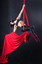 The woman is engaged in aerial acrobatics. Royalty Free Stock Photo