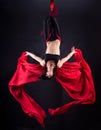 The woman is engaged in aerial acrobatics. Royalty Free Stock Photo