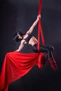 The woman is engaged in aerial acrobatics. Royalty Free Stock Photo