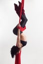 The woman is engaged in aerial acrobatics. Royalty Free Stock Photo