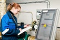 Woman engineer in a boiler room