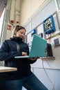 Woman engineer checking solar panel system with laptop Royalty Free Stock Photo