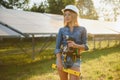 Woman engineer checking solar panels setup Royalty Free Stock Photo