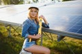 Woman engineer checking solar panels setup Royalty Free Stock Photo