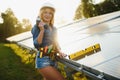 Woman engineer checking solar panels setup Royalty Free Stock Photo