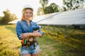 Woman engineer checking solar panels setup Royalty Free Stock Photo