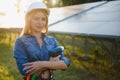 Woman engineer checking solar panels setup Royalty Free Stock Photo