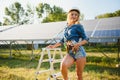 Woman engineer checking solar panels setup Royalty Free Stock Photo
