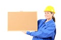 Woman engineer cork board in hand Royalty Free Stock Photo