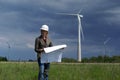 Woman engineer safety hat wind turbines