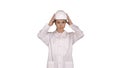 Woman engineer in white robe and white hard hat walking on white background. Royalty Free Stock Photo