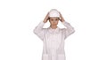 Woman engineer in white robe and white hard hat walking on white Royalty Free Stock Photo