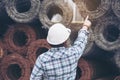 Woman engineering working on construction site and holding yellow hard hat safety helmet. Construction Concept Royalty Free Stock Photo