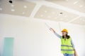Woman engineers working in side building planning for the ceiling Royalty Free Stock Photo