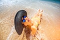 Woman engoying sun and water on the beach Royalty Free Stock Photo