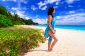 Woman enjoing sun holidays at the beach