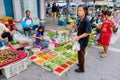 A woman is enjoy choosing fruits at Prachuabkirikhan morning market showing local lifestyle. Prachuabkirikhan Thailand June 10,