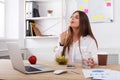 Woman enjoy healthy business lunch in modern office interior Royalty Free Stock Photo