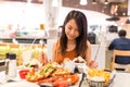 Woman enjoy her dinner in restaurant Royalty Free Stock Photo