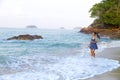 Woman enjoy in morning in Lonely Beach Royalty Free Stock Photo