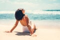 Woman enjoy with sun on beautiful sand ocean beach Royalty Free Stock Photo