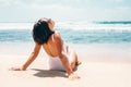 Woman enjoy with sun on beautiful sand ocean beach Royalty Free Stock Photo