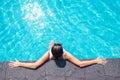 Woman enjoy the sun in swimming pool Royalty Free Stock Photo