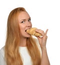 Woman enjoy sweet croissant. Unhealthy junk food dessert concept Royalty Free Stock Photo